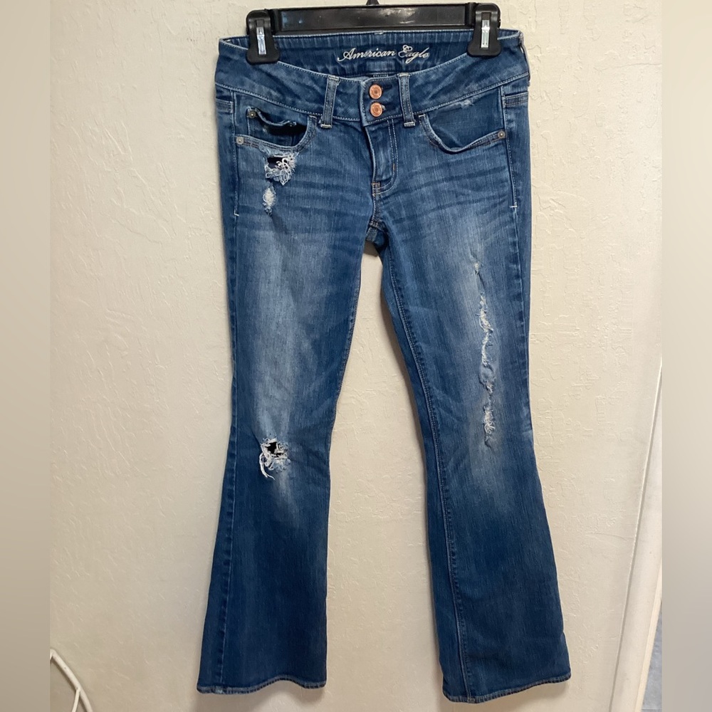 American Eagle ripped flare low rise jeans size 4